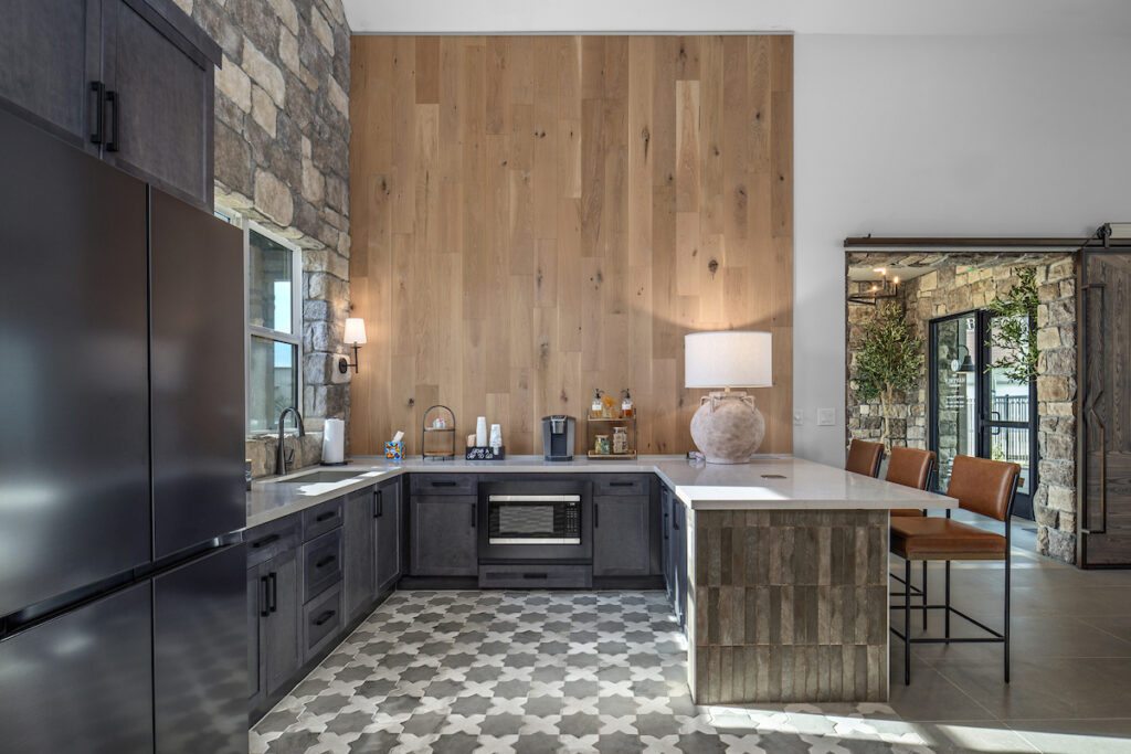 Kitchen and view into the entrance at the clubhouse for The Havenly Prescott